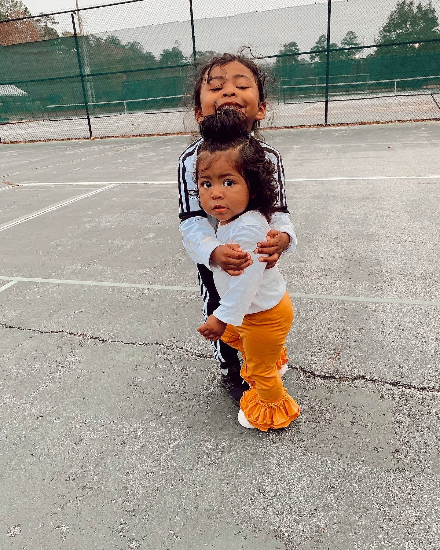 Isiah joined the competition — help win amazing prizes! asphalt, baby, child, costume, eye, face, fence, fun, fur, gesture, happy, hat, joy, pedestrian, people_in_nature, person, recreation, shoe, sky, toddler