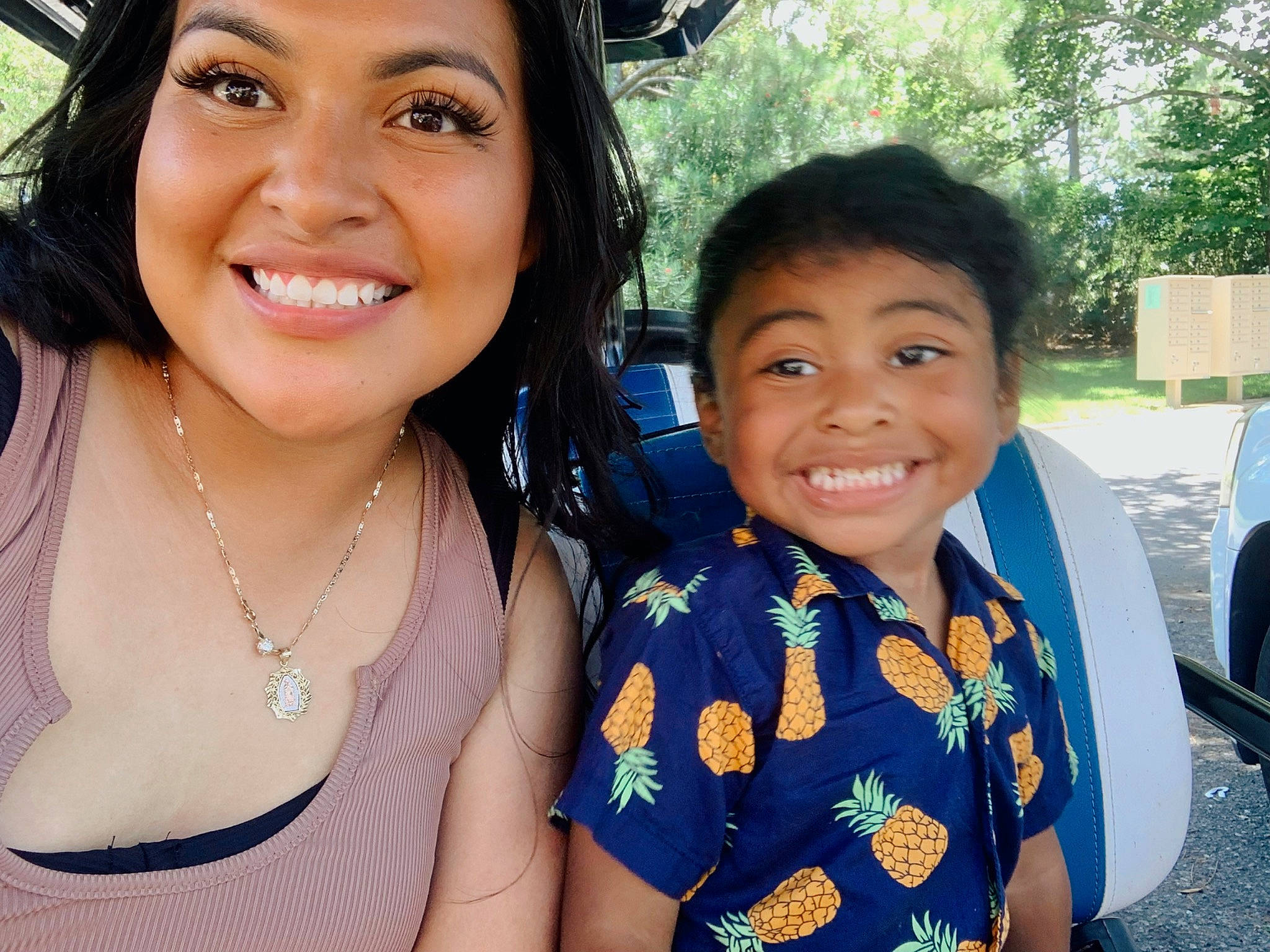 Isiah is registered to the contest to win money with this photo: black_hair, chair, chin, cool, event, eye, eyelash, face, facial_expression, fun, hairstyle, happy, iris, jewellery, joy, leisure, necklace, person, skin, smile