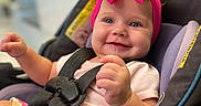 Lakelynn joined the competition — help win amazing prizes! baby, car_seat, child, chubby_cheeks, closeup, clothing, cute, face, hand, happy, headband, indoor, infant, person, pink_bow, portrait, seatbelt, sitting, smile, young