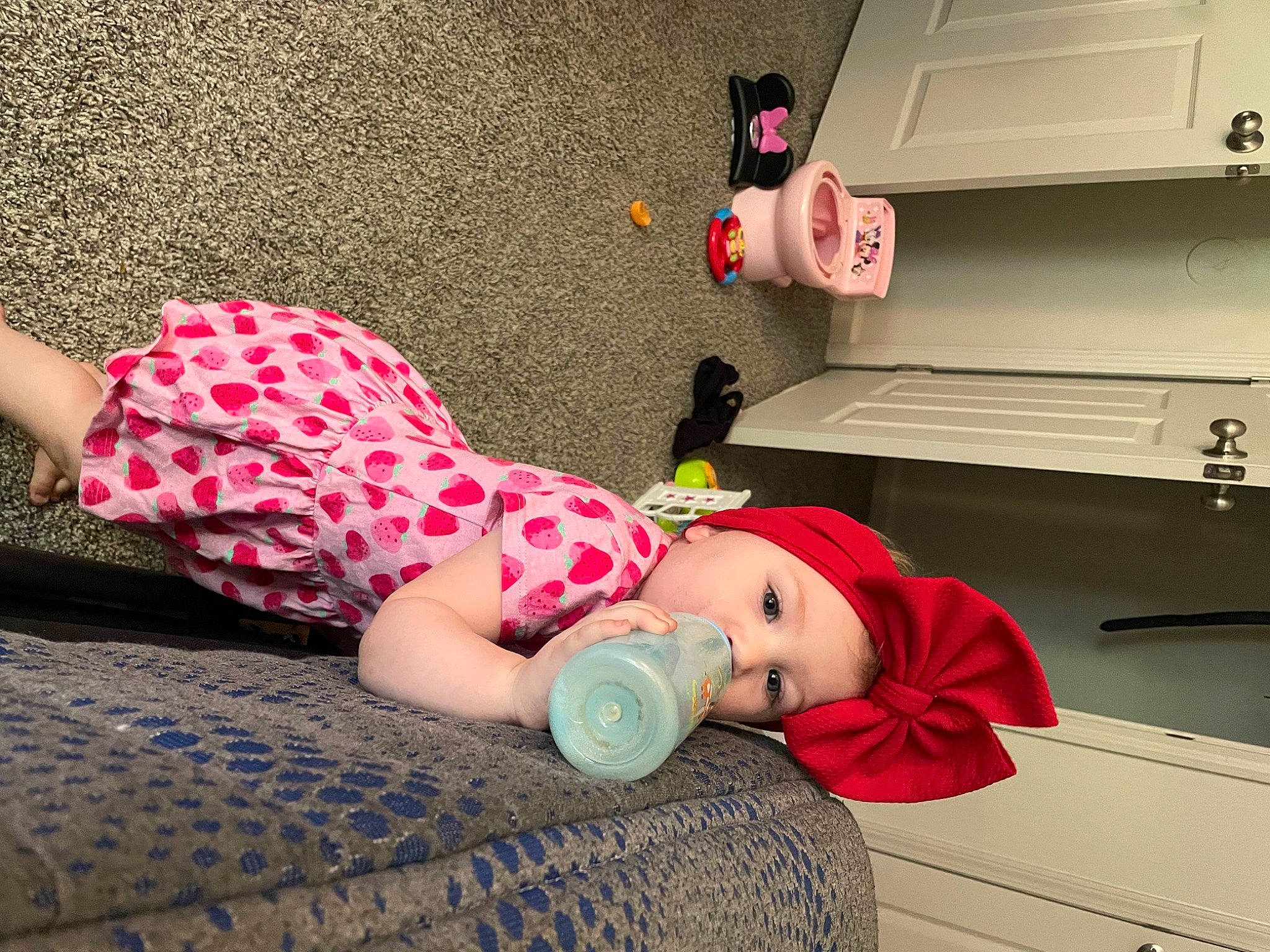 Londyn joined the competition — help win amazing prizes! baby, cabinetry, child, comfort, doll, drawer, floor, flooring, hat, headwear, human_leg, joint, leisure, magenta, pattern, person, pink, room, thigh, toddler