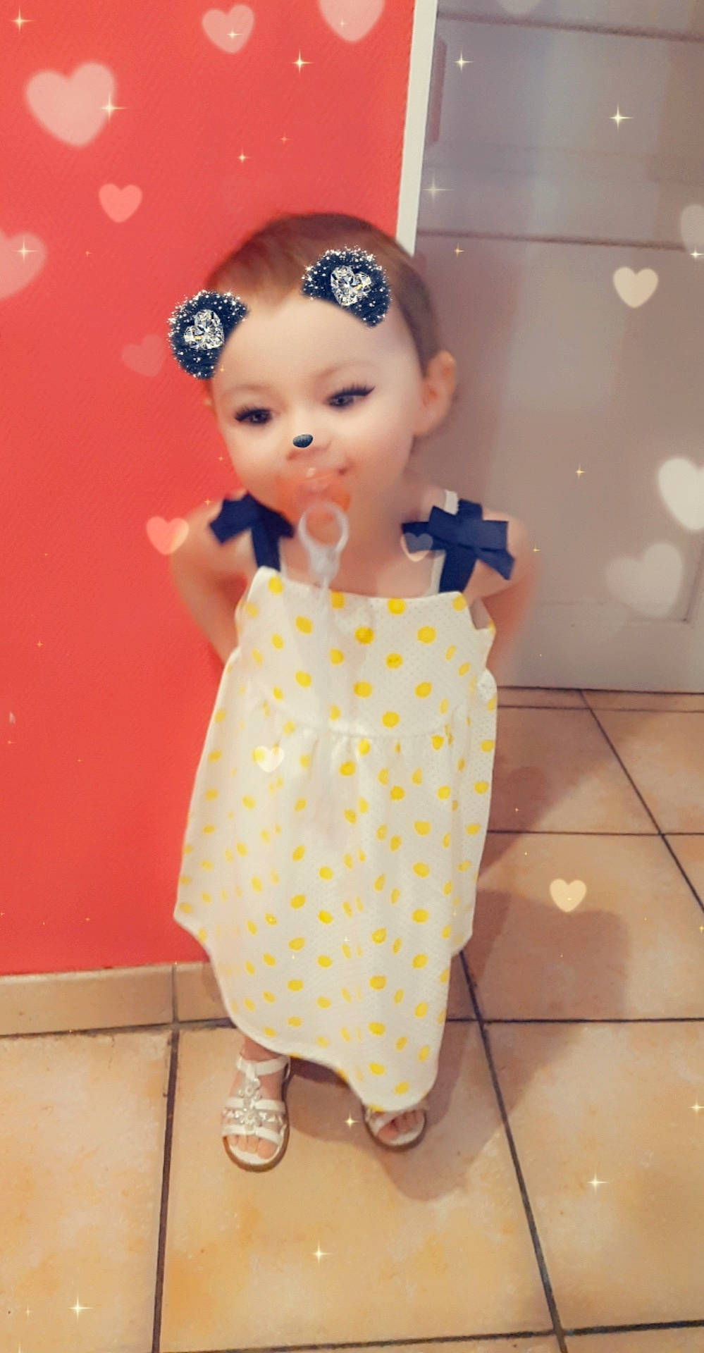 Lya a rejoint le concours — aidez-le/la à gagner de superbes lots ! child, doll, dress, pattern, peach, person, polka_dot, toddler, toy, yellow