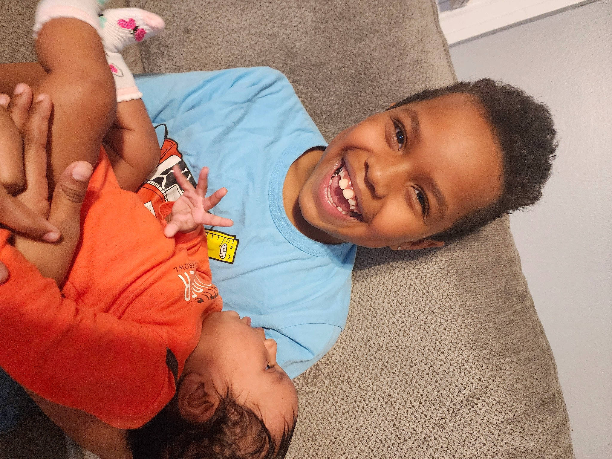 Elijah is registered to the contest to win money with this photo: abdomen, baby, child, comfort, couch, eye, finger, happy, human_body, joint, joy, leg, mouth, muscle, nose, person, shoulder, skin, smile, thigh