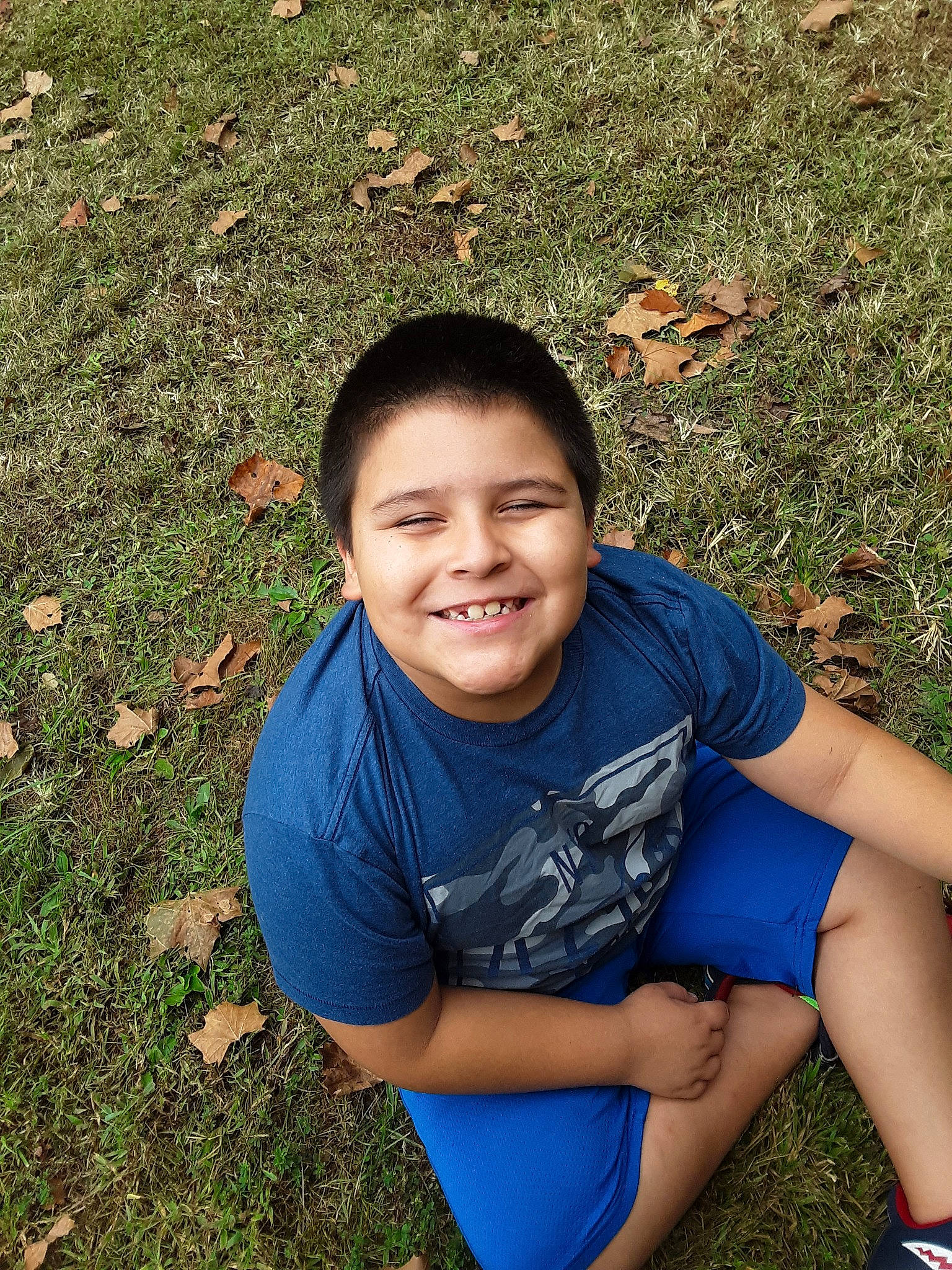 Elijah joined the competition — help win amazing prizes! child, cool, eye, face, facial_expression, fun, grass, grass_family, happy, head, joy, lawn, leaf, leg, people, person, photography, plant, sitting, smile