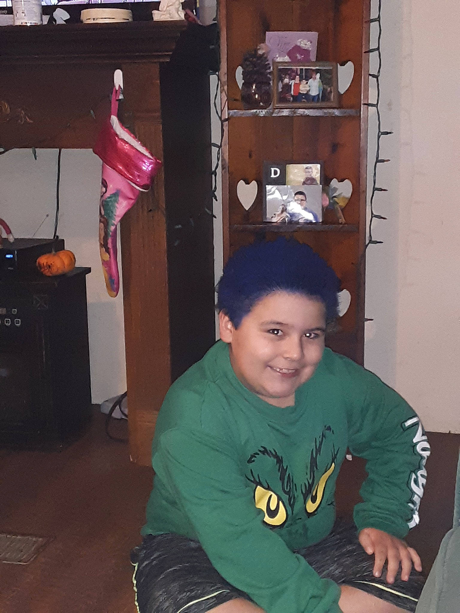 Elijah is registered to the contest to win money with this photo: black_hair, child, joy, neck, person, sitting