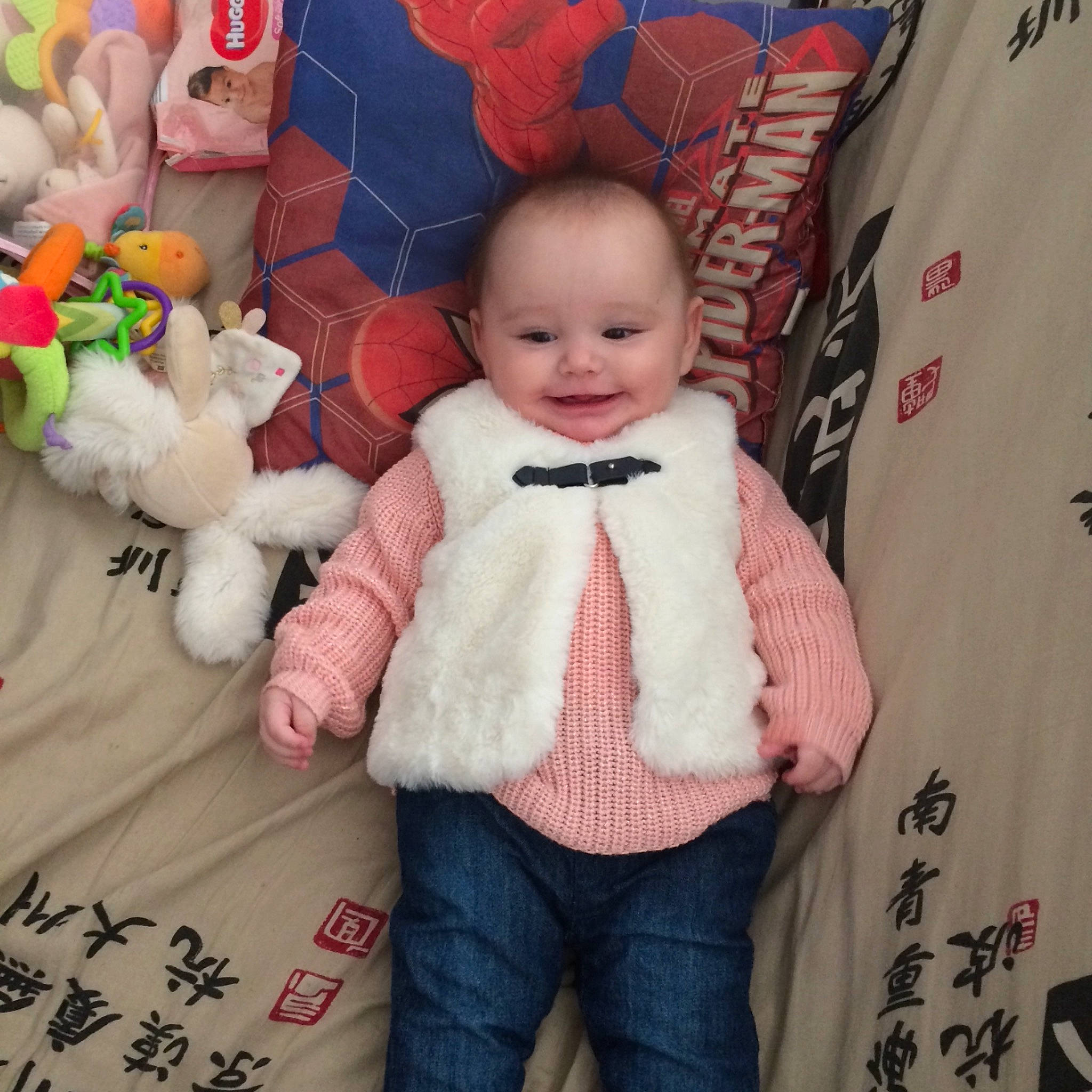 Nathea participe au concours pour gagner de l'argent avec cette photo : baby, baby_toddler_clothing, cheek, child, doll, eye, happy, jacket, joy, linens, mammal, outerwear, pattern, person, pink, skin, sleeve, smile, t_shirt, textile