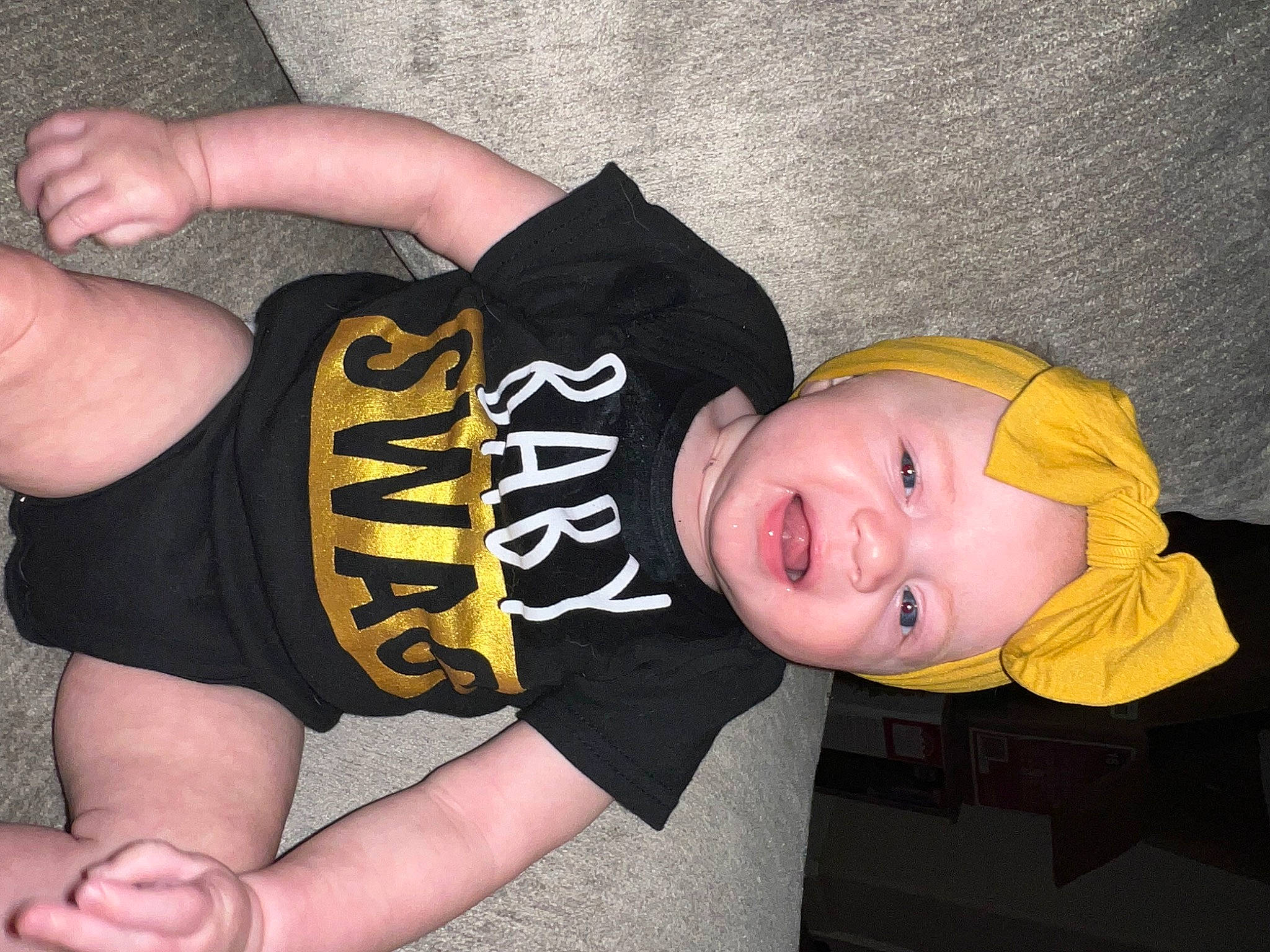 Ari Avery joined the competition — help win amazing prizes! baby_toddler_clothing, cap, costume_hat, elbow, fashion_accessory, finger, hand, happy, hat, headwear, person, sleeve, smile, thigh, thumb, toddler, wrist