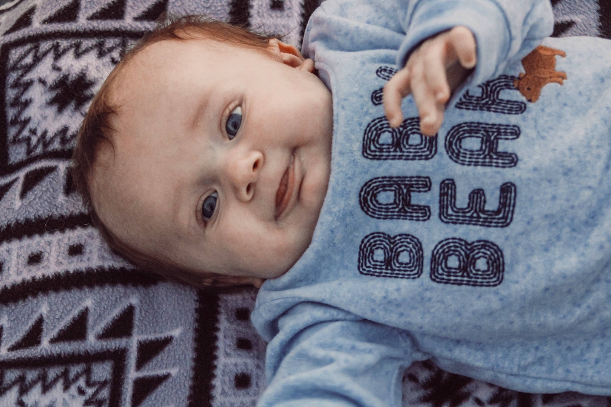 Greysen is registered to the contest to win money with this photo: baby, cheek, child, eye, face, forehead, hand, head, nose, person, skin, toddler