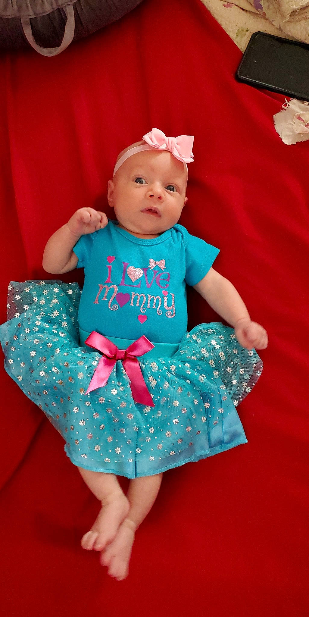 Brooklyn joined the competition — help win amazing prizes! baby, baby_toddler_clothing, child, day_dress, electric_blue, event, face, fun, happy, magenta, one_piece_garment, pattern, person, pink, red, sitting, skin, sleeve, t_shirt, textile