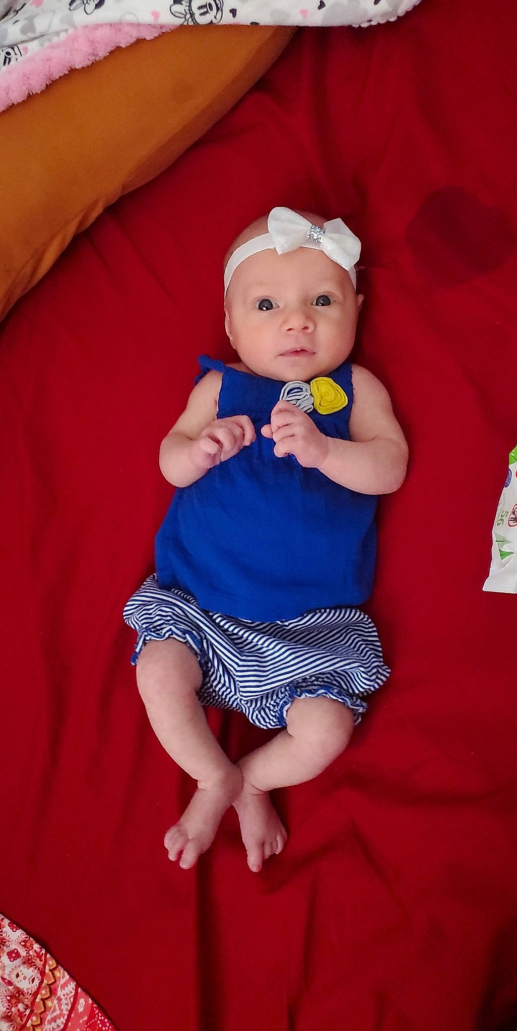 Brooklyn joined the competition — help win amazing prizes! baby, baby_toddler_clothing, comfort, day_dress, dress, eye, face, hat, head, headwear, human_body, human_leg, knee, pattern, person, pink, purple, skin, sleeve, textile