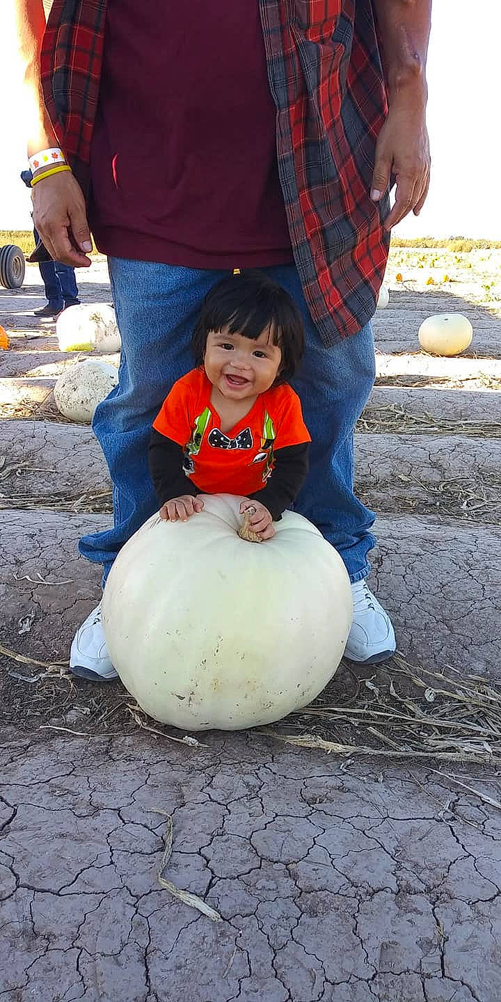 Jesus is registered to the contest to win money with this photo: child, fun, girl, joy, person, play, recreation, sitting, toddler, vacation