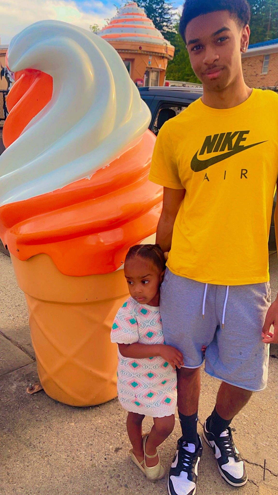 Chanel is registered to the contest to win money with this photo: blue, clothing, electric_blue, facial_expression, fun, hairstyle, happy, leisure, orange, organ, people, person, photograph, recreation, shorts, snapshot, standing, t_shirt, toddler, white