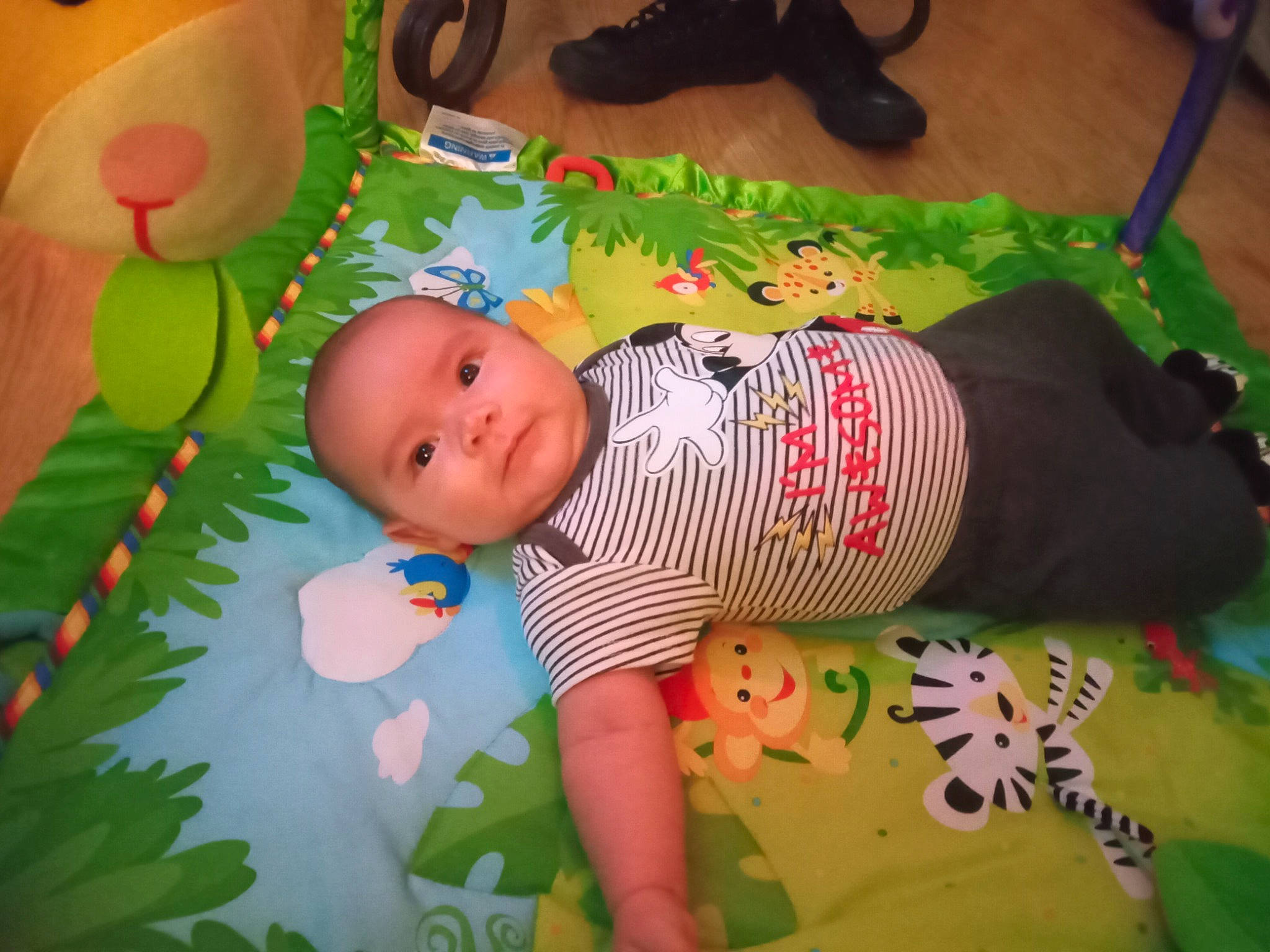Malachi joined the competition — help win amazing prizes! baby, baby_products, baby_toddler_clothing, cheek, child, comfort, flooring, fun, grass, green, linens, pattern, person, pink, play, playmat, room, skin, textile, toddler