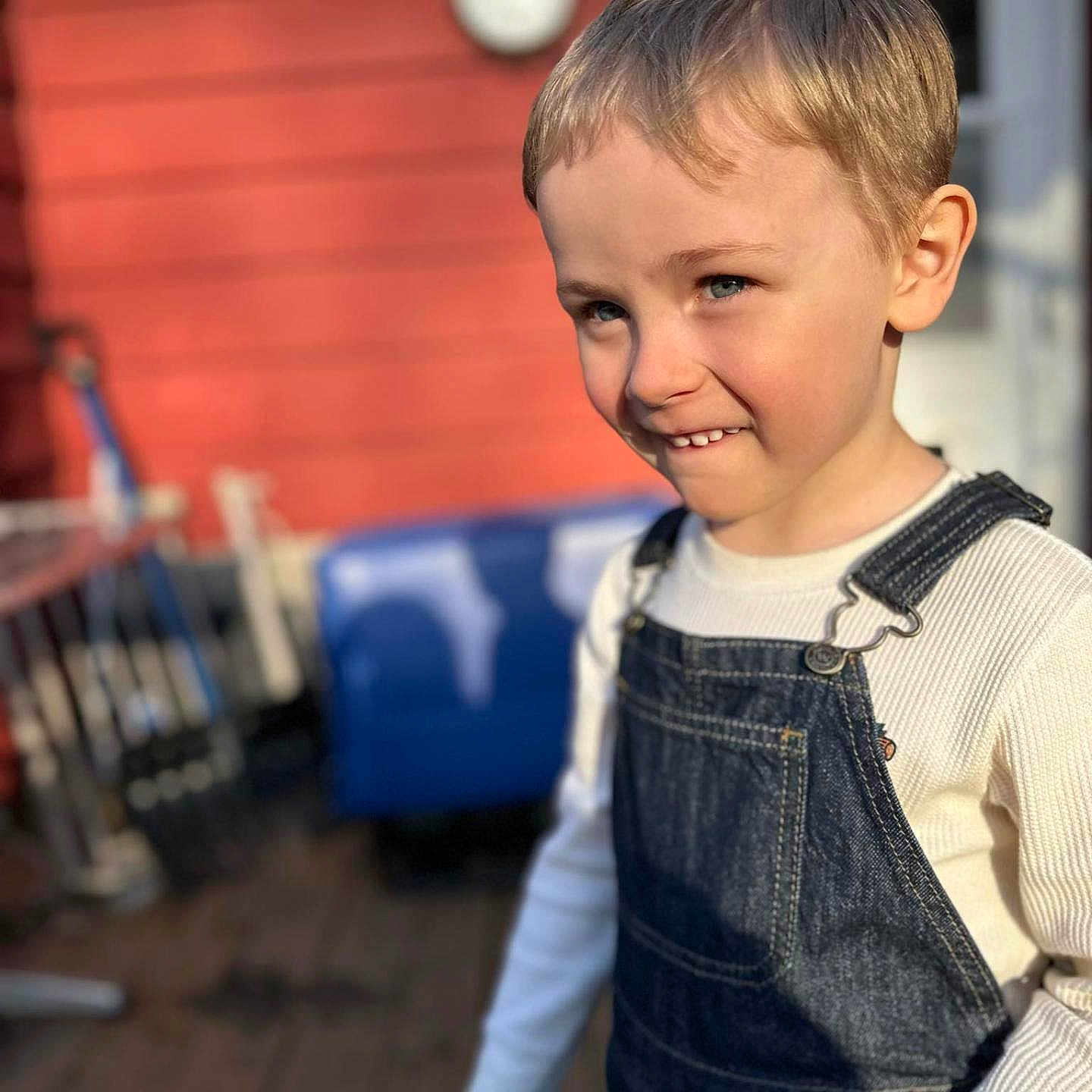Bentlee is registered to the contest to win money with this photo: blackhair, blonde, boy, brownhair, child, clothing, face, hair, happy, head, jeans, male, pants, person, photography, portrait, sitting, sleeve, smile, vest