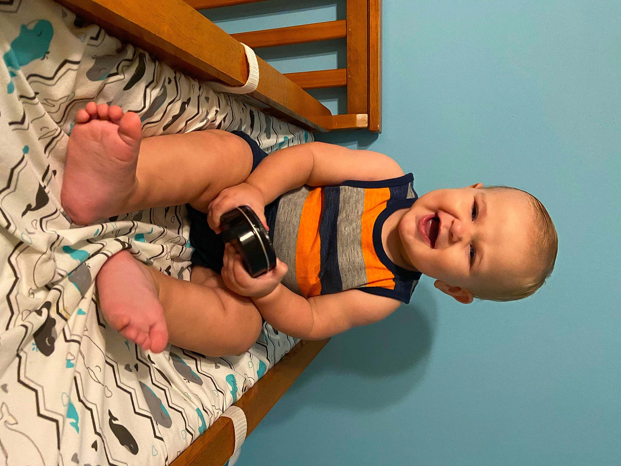 Boston is registered to the contest to win money with this photo: arm, baby, child, ear, finger, hand, joint, leg, muscle, person, play, thumb, toddler, vacation