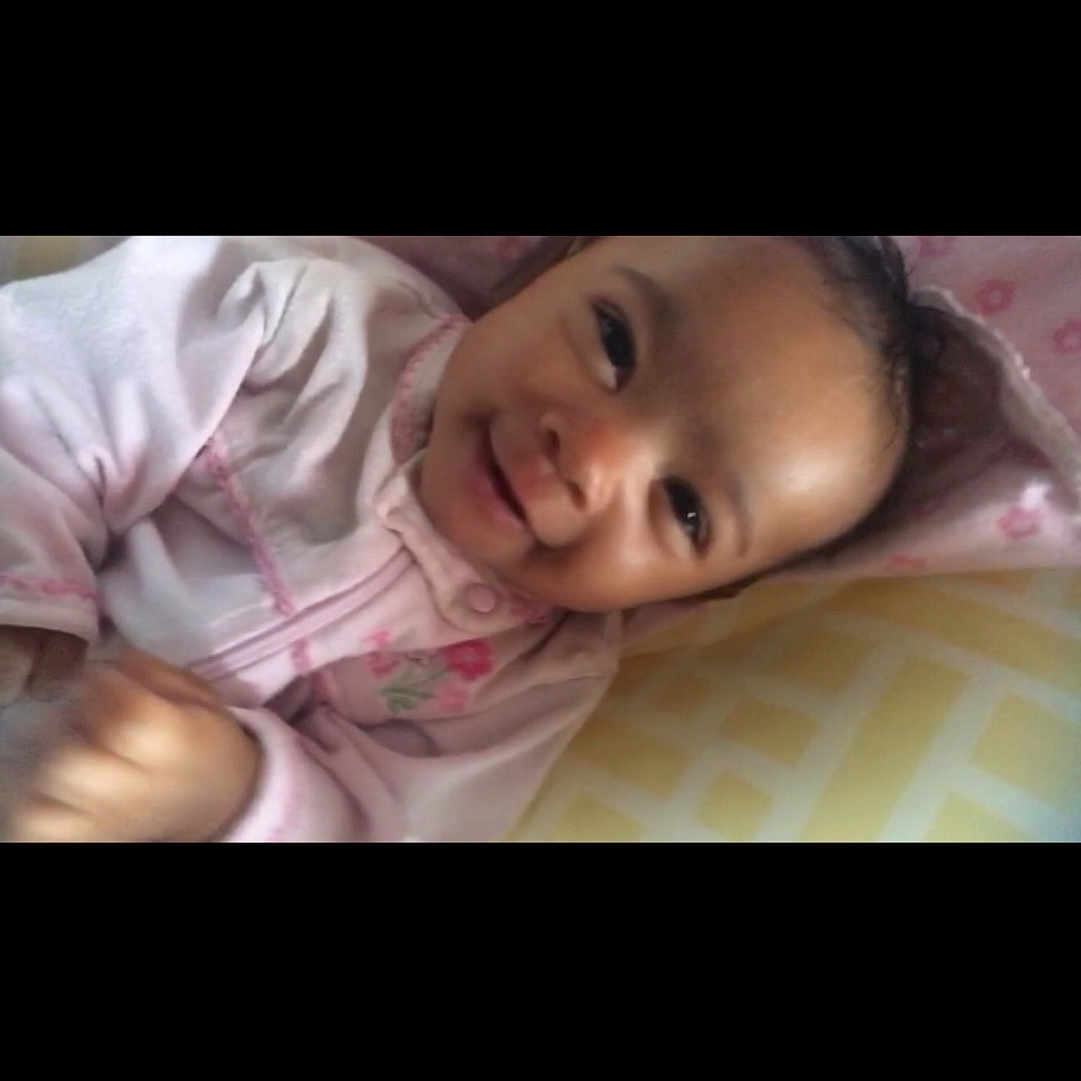 Amiyah joined the competition — help win amazing prizes! beauty, black_hair, cheek, child, close_up, face, finger, forehead, girl, hand, head, human_hair_color, infant, lip, mouth, nose, smile