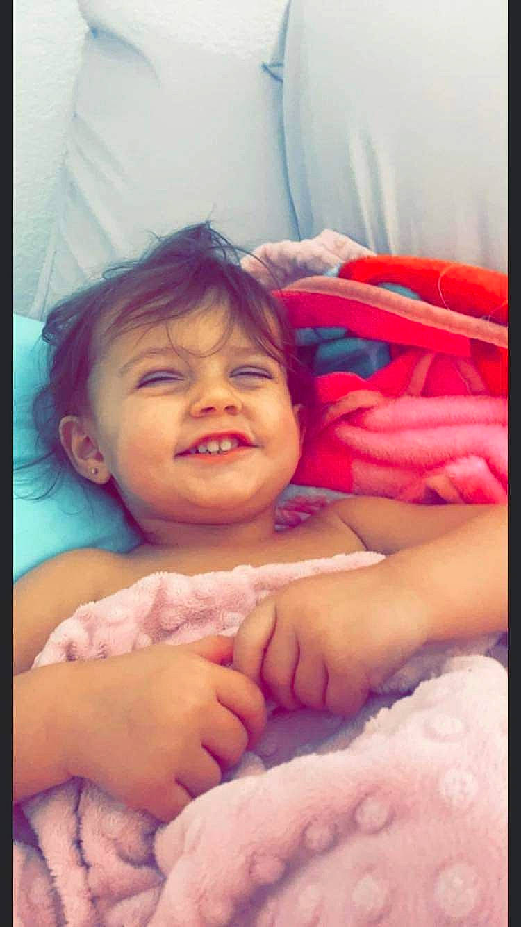 Adelynne is registered to the contest to win money with this photo: baby, beauty, child, chin, comfort, eyebrow, face, finger, fun, gesture, hair, happy, human, joy, linens, lip, mouth, person, pink, skin