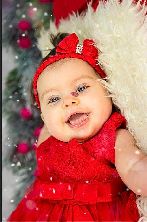 Ellie-mai is registered to the contest to win money with this photo: baby, baby_laughing, cheek, child, child_model, christmas, facial_expression, fashion_accessory, hair_accessory, happy, head, headgear, headpiece, lip, person, photography, pink, red, skin, smile