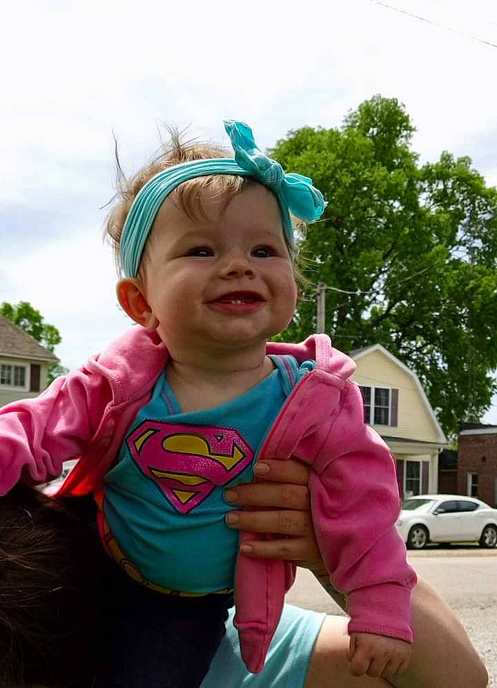 Fraya joined the competition — help win amazing prizes! baby, baby_toddler_clothing, grass, happy, hat, joy, leisure, magenta, person, personal_protective_equipment, pink, plant, recreation, skin, sky, sleeve, smile, tire, toddler, tree