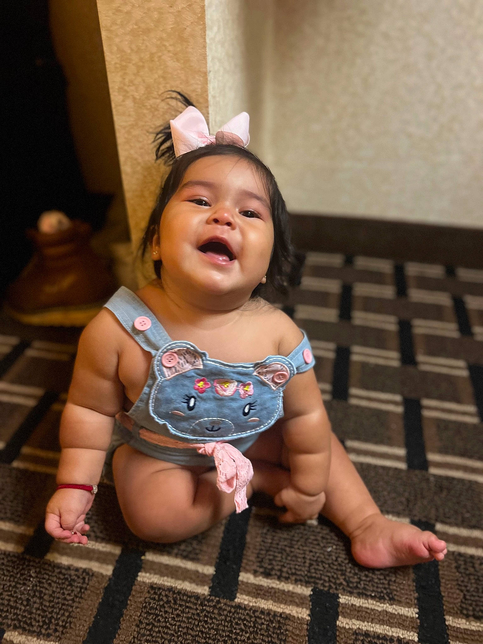 Yaretzi is registered to the contest to win money with this photo: baby, baby_toddler_clothing, barefoot, finger, flash_photography, flooring, fun, happy, human_leg, iris, mouth, pattern, person, pink, sitting, skin, smile, snapshot, thigh, toddler