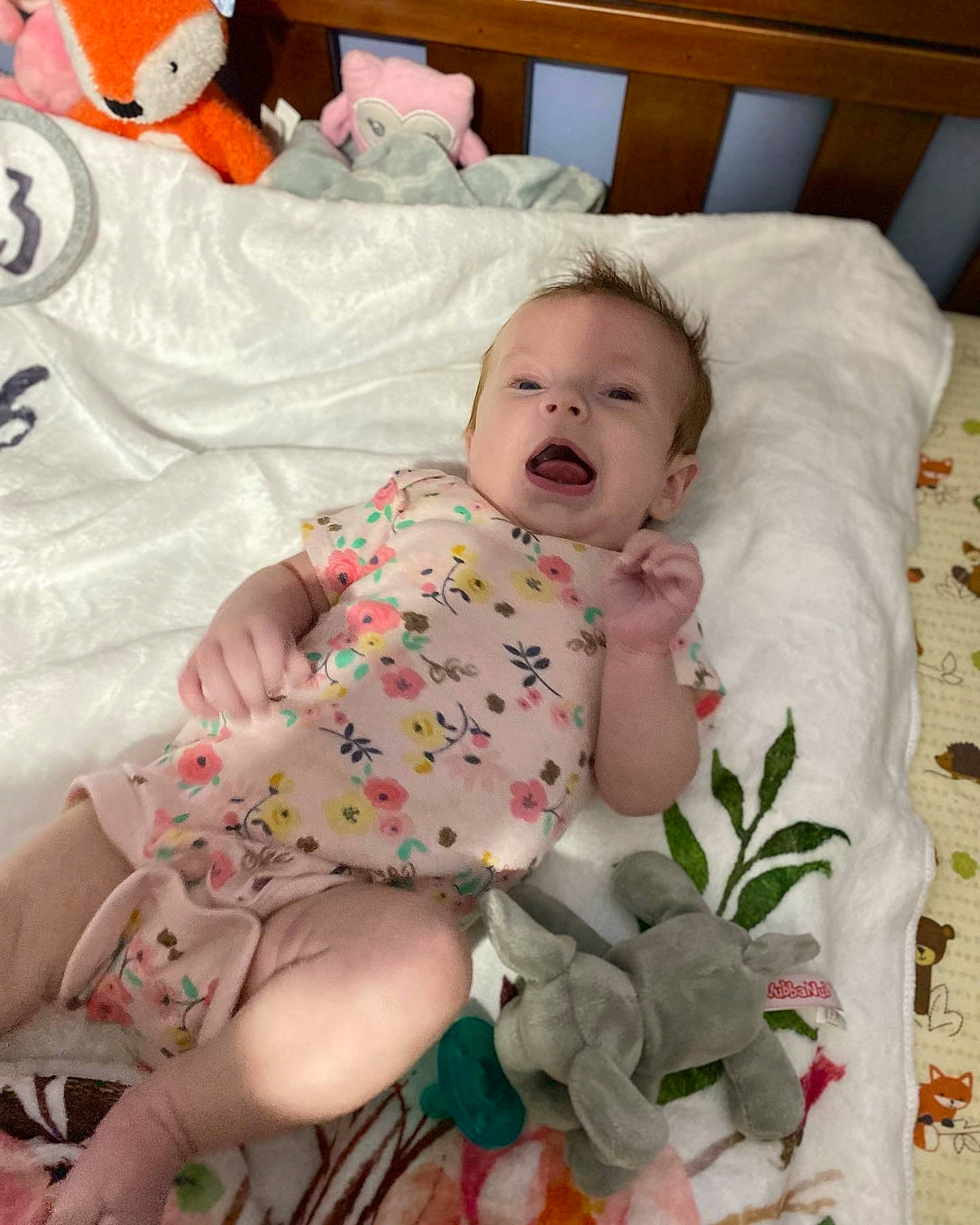 Kinsley is registered to the contest to win money with this photo: baby, baby_products, baby_safety, baby_sleeping, baby_toddler_clothing, bed, bed_sheet, bedding, cheek, child, comfort, linens, pattern, person, room, sitting, skin, sleeve, smile, textile