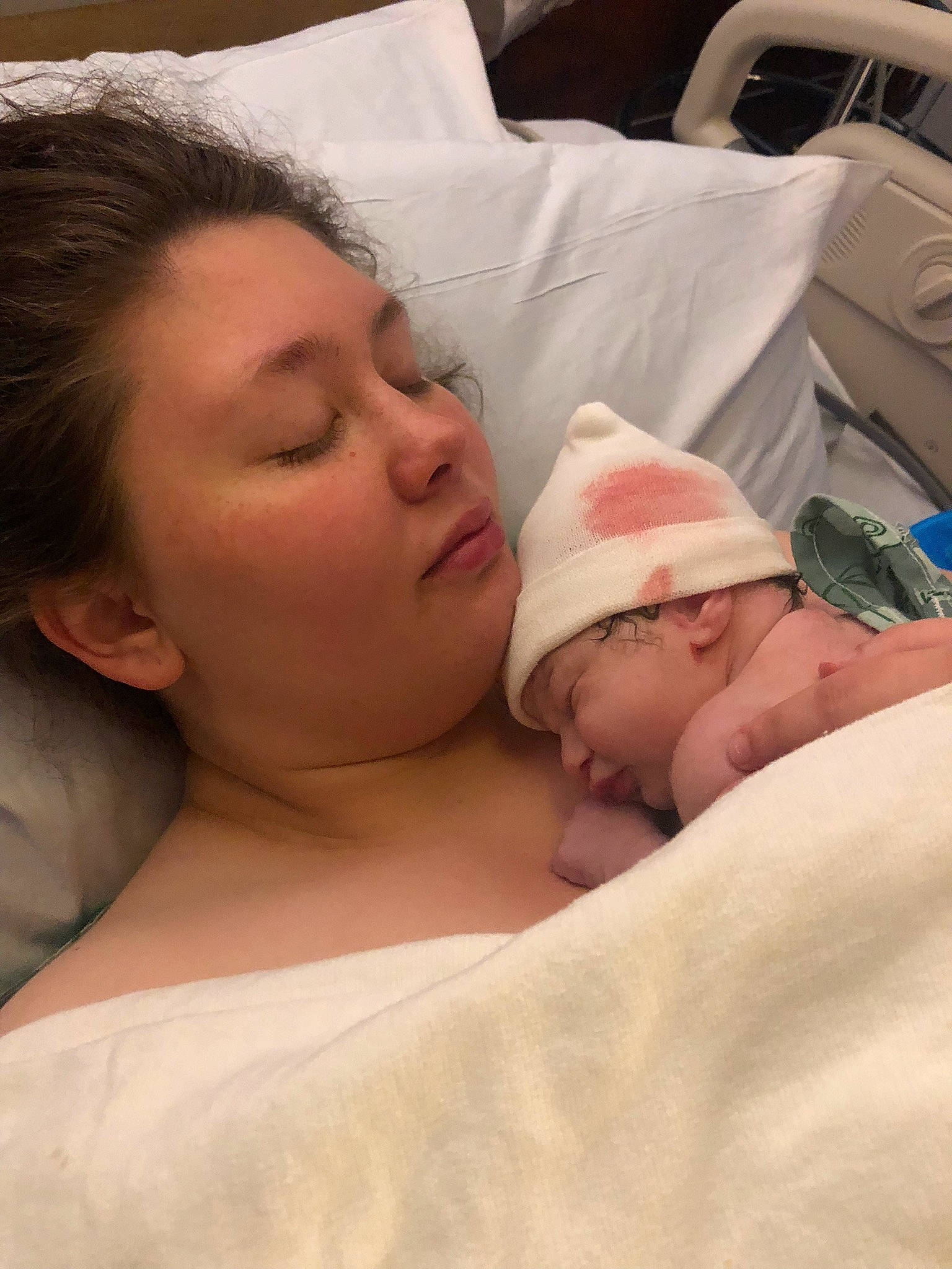 Kinsley is registered to the contest to win money with this photo: baby, baby_products, baby_sleeping, child, comfort, event, eyebrow, eyelash, happy, hat, headgear, health_care, hospital, hospital_bed, linens, mouth, nose, patient, person, skin