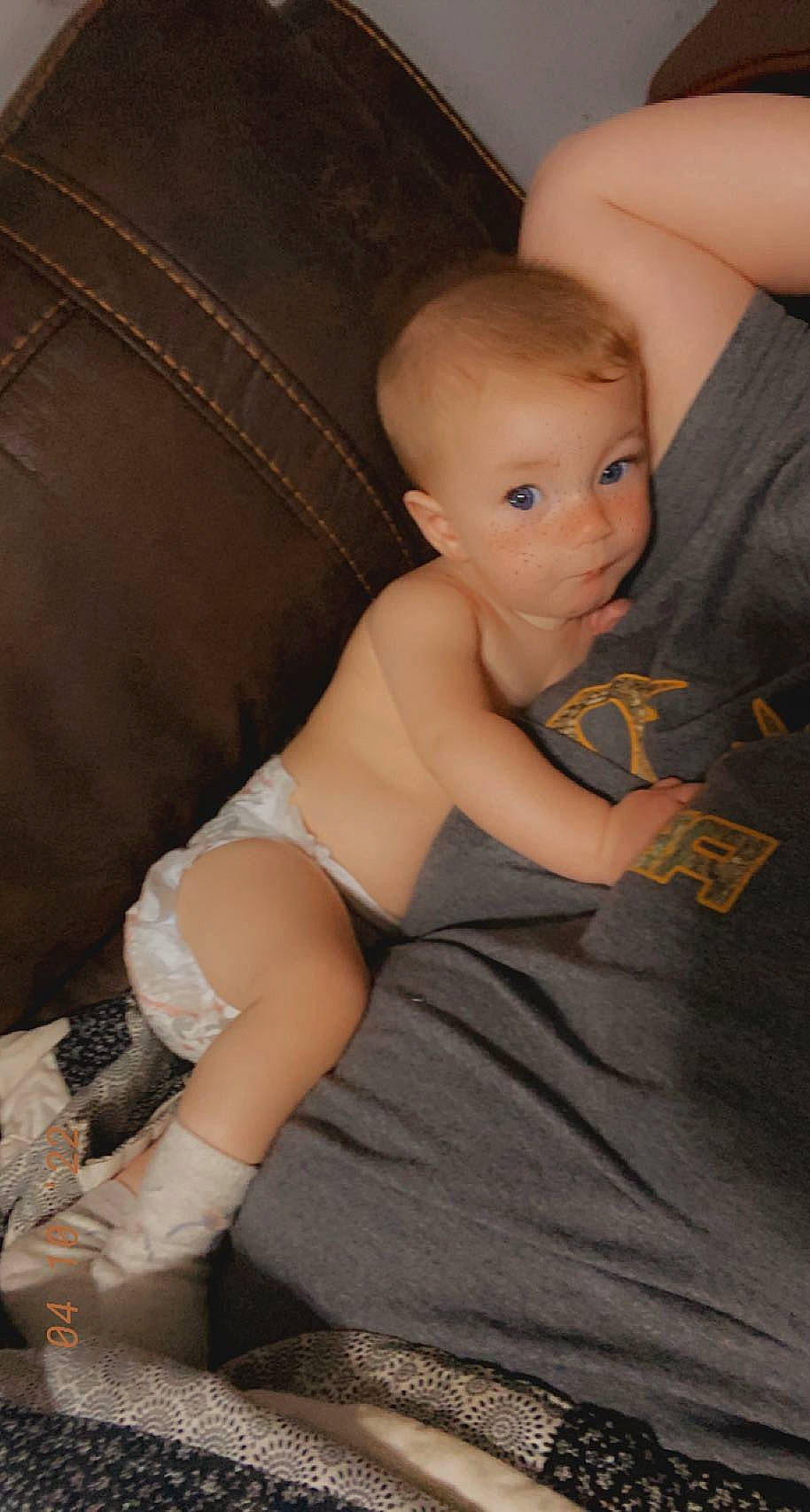 Kinsley is registered to the contest to win money with this photo: abdomen, baby, barechested, chest, comfort, elbow, flash_photography, flooring, foot, human_leg, knee, leg, navel, neck, person, sitting, stomach, thigh, thumb, toddler