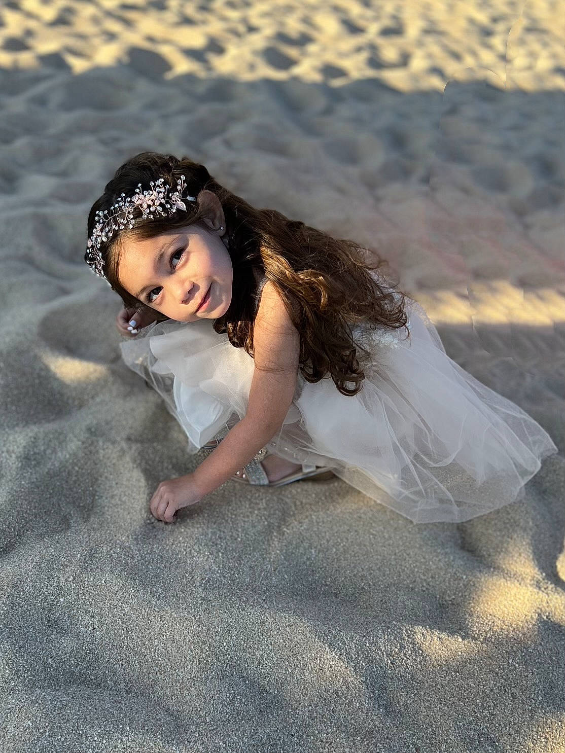 Annalea is registered to the contest to win money with this photo: beach, child, coast, dress, flash_photography, fun, grass, happy, landscape, leisure, ocean, people_in_nature, person, portrait_photography, sand, shadow, sitting, toddler, vacation, wave