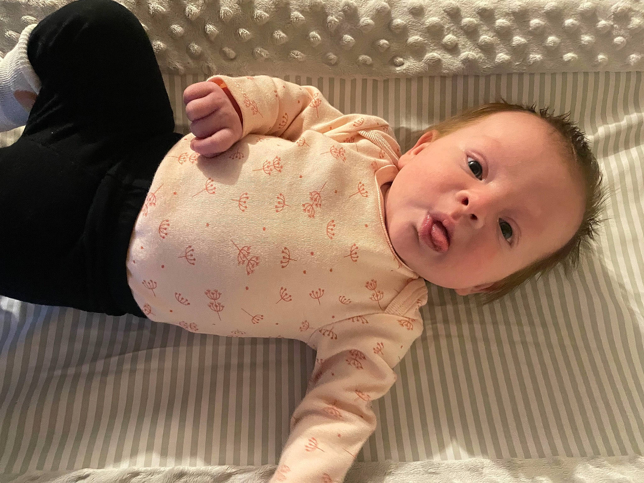 Alyvia joined the competition — help win amazing prizes! baby, baby_products, baby_safety, baby_toddler_clothing, cheek, child, comfort, foot, headgear, human_body, human_leg, knee, linens, nightwear, pattern, person, sitting, skin, sleeve, thumb