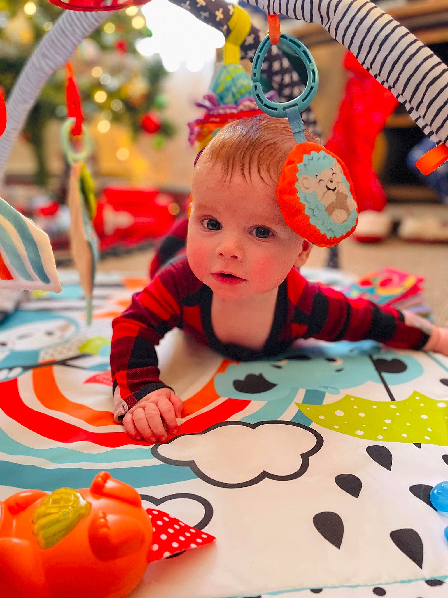 Junior joined the competition — help win amazing prizes! baby, baby_playing_with_toys, baby_toddler_clothing, child, event, facial_expression, fun, happy, holiday, leisure, orange, party, party_supply, person, photograph, play, product, recreation, red, toddler
