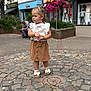 Darcie-Rae joined the competition — help win amazing prizes! child, girl, outdoor, cobblestone, street, flower, plant, bench, man, clothing, skirt, top, sandals, bow, side_view, pavement, shop, mannequin, urban, daylight