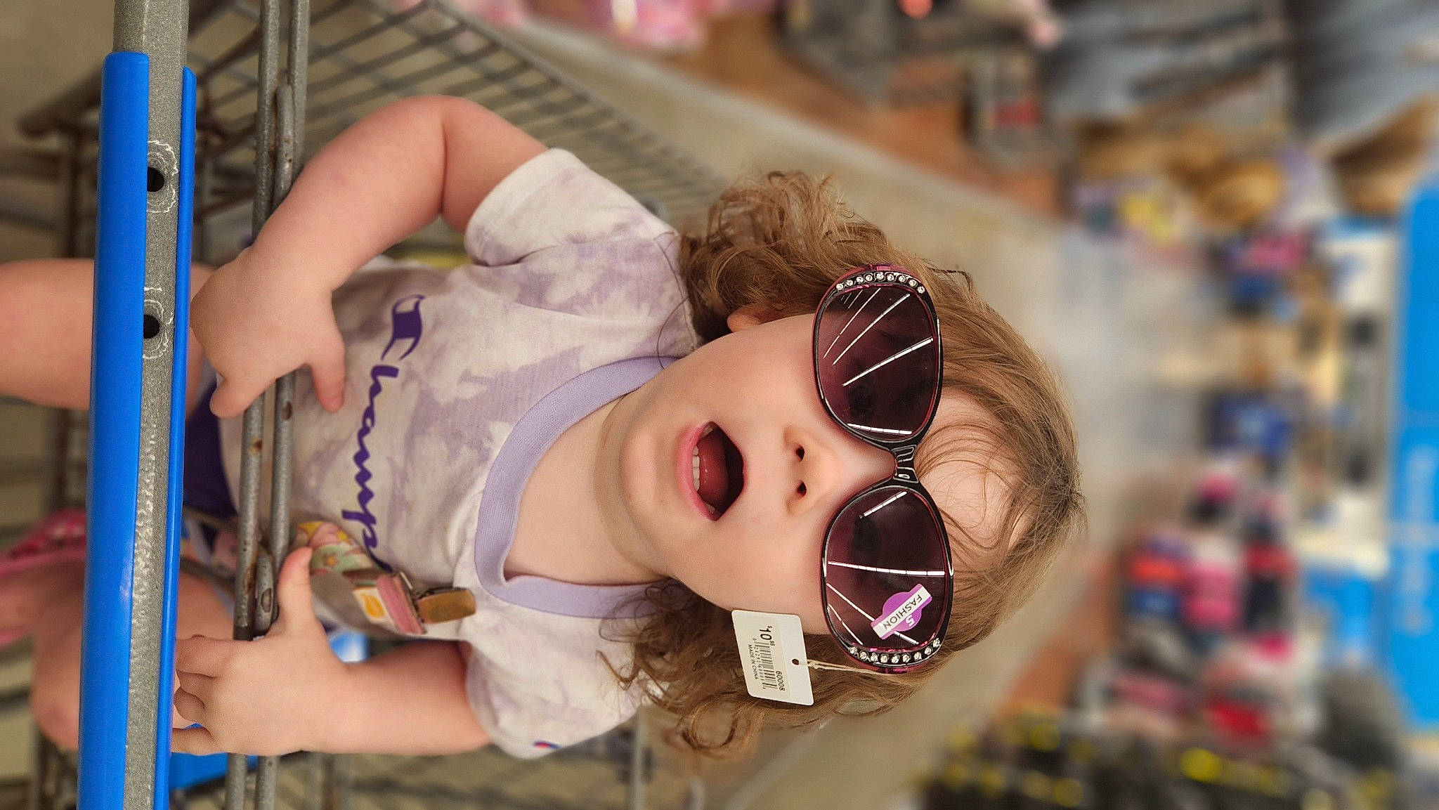 Peyton is registered to the contest to win money with this photo: baby, child, costume, doll, event, eyelash, eyewear, fan, fun, goggles, happy, helmet, leisure, mask, person, personal_protective_equipment, sunglasses, toddler, toy, vision_care