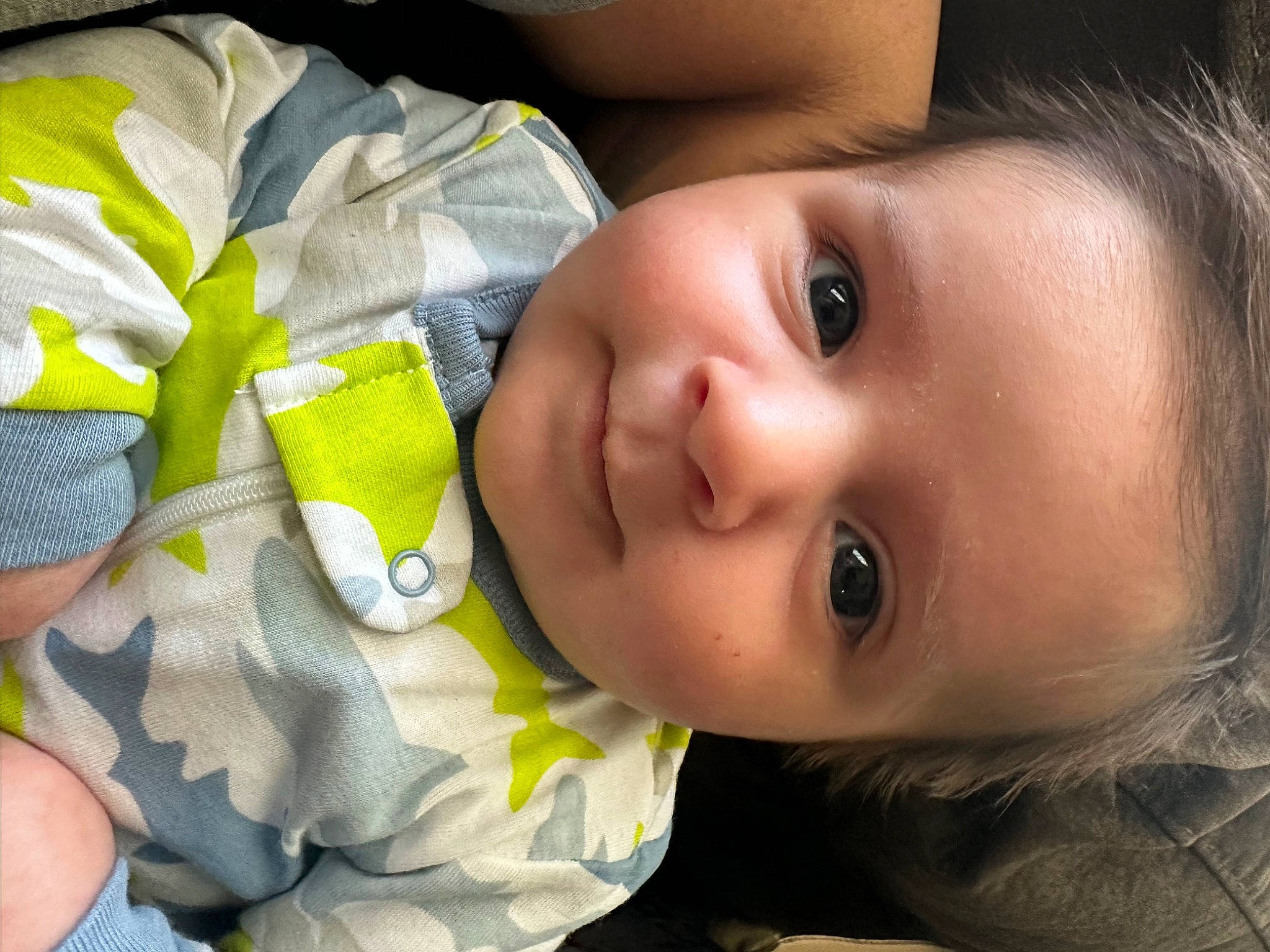 Kayden is registered to the contest to win money with this photo: baby, baby_toddler_clothing, cheek, child, close_up, eye, eyebrow, eyelash, facial_expression, flash_photography, grass, happy, iris, lip, mouth, nose, person, plant, skin, toddler