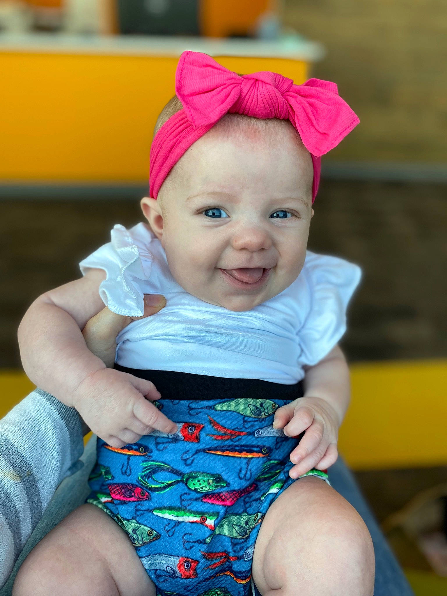 Callie joined the competition — help win amazing prizes! baby, baby_toddler_clothing, blue, cap, costume_hat, electric_blue, eye, face, fun, happy, hat, head, human_body, human_leg, joy, leisure, person, skin, smile, standing