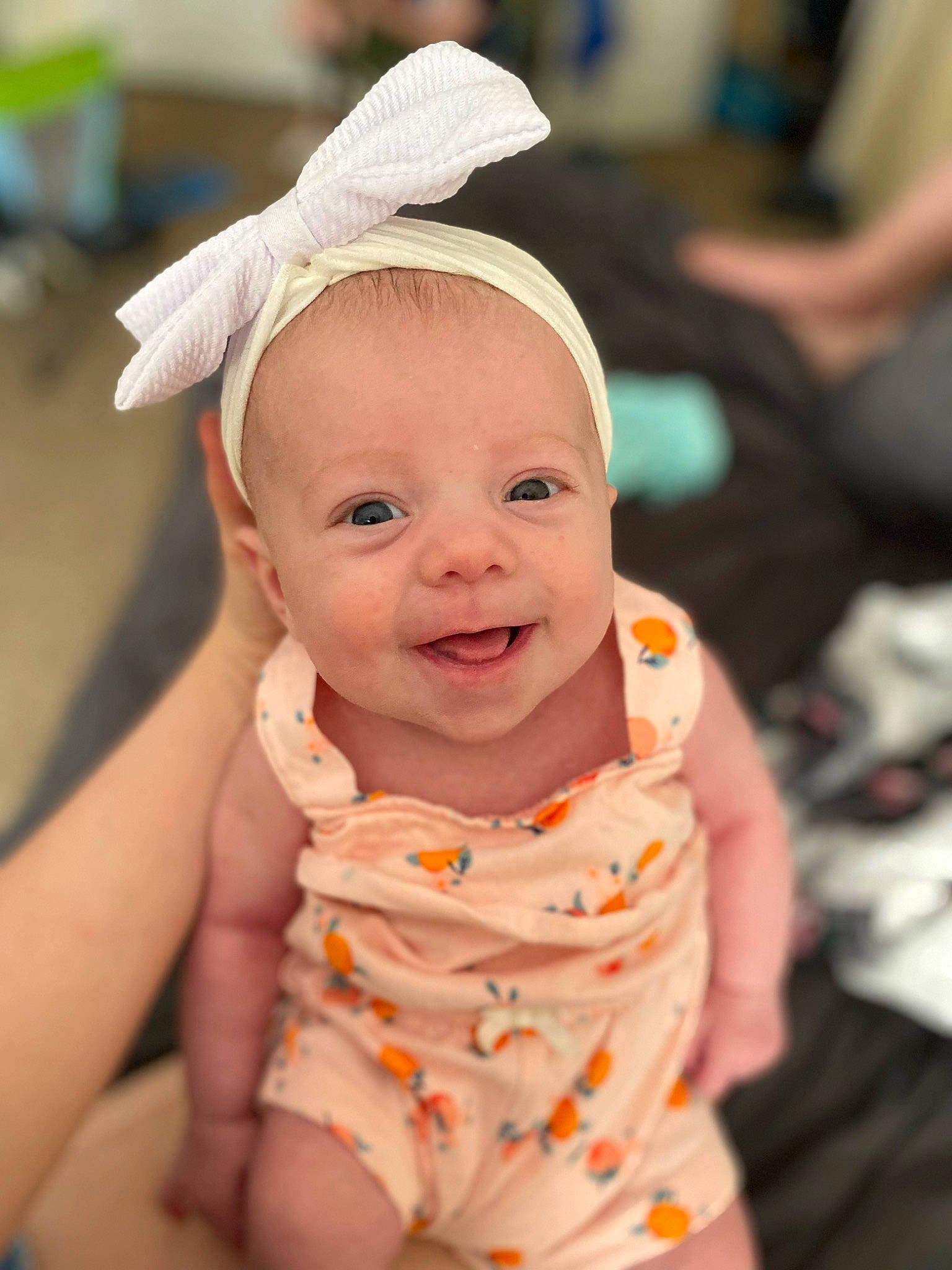 Callie joined the competition — help win amazing prizes! baby, baby_toddler_clothing, cap, child, costume_hat, event, fashion_accessory, fun, happy, hat, headband, holiday, laugh, peach, person, portrait_photography, sitting, skin, smile, toddler