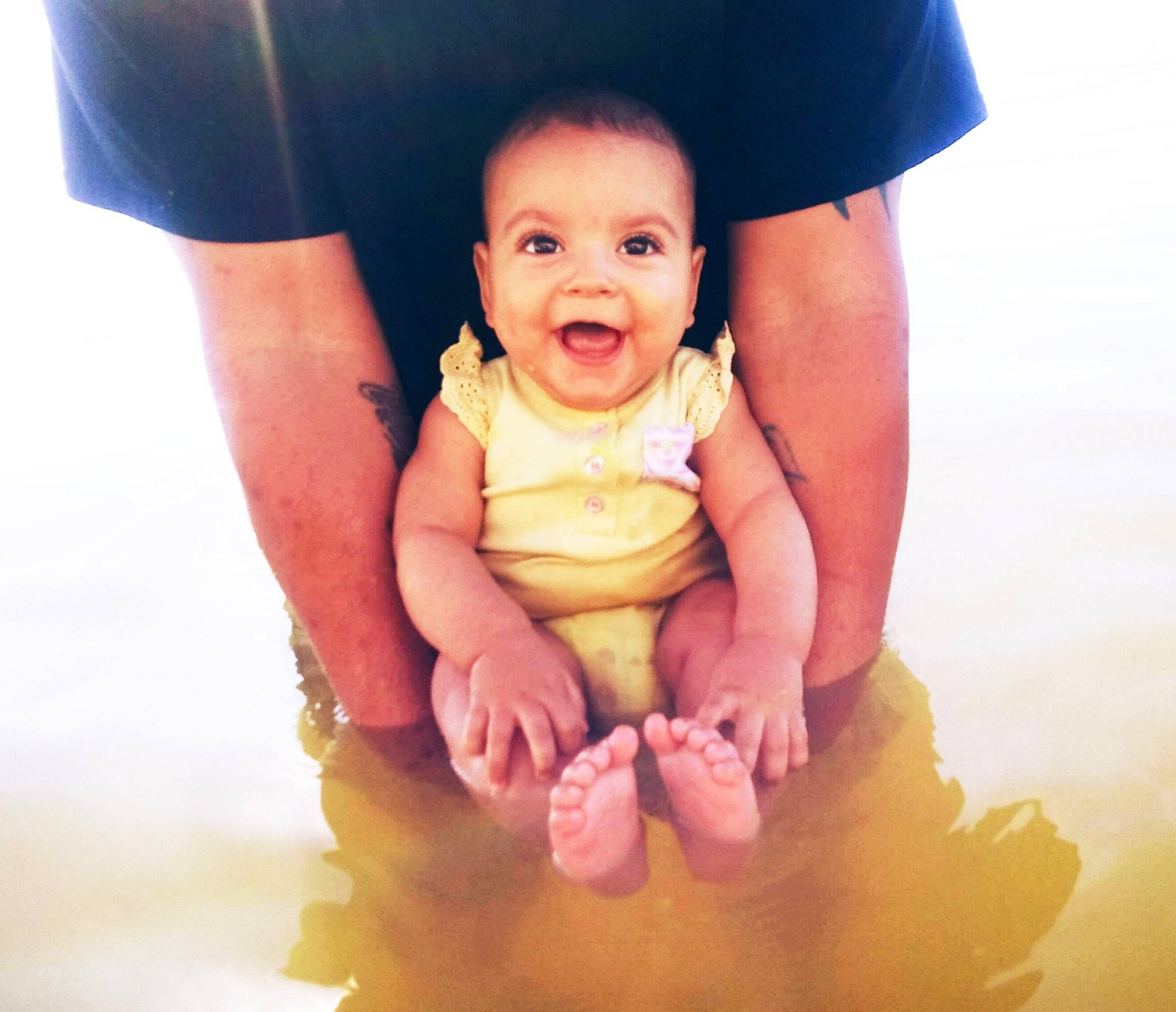 Alison is registered to the contest to win money with this photo: arm, baby, cheek, child, eye, face, facial_expression, finger, fun, hand, happy, leg, nose, person, photograph, pink, skin, smile, snapshot, toddler