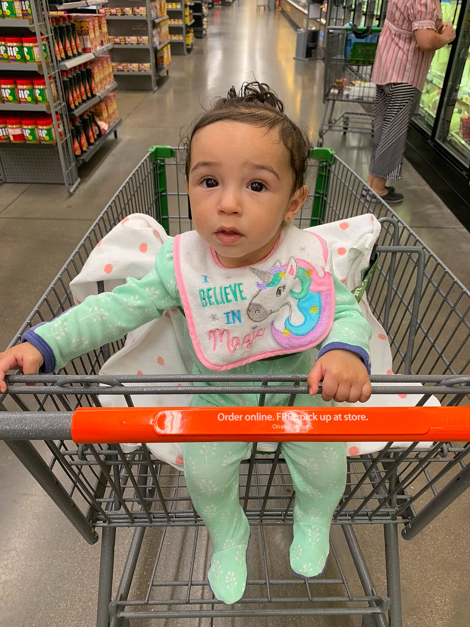 Cailee is registered to the contest to win money with this photo: baby, cart, child, person, shopping_cart, sitting, supermarket, toddler, vehicle