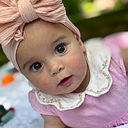 Sofia joined the competition — help win amazing prizes! baby, baby_girl, child, closeup, clothing, collar, curious, cute, embroidery, expression, eyes, face, headband, infant, natural_background, outdoor, pink_bow, portrait, skin, soft_light
