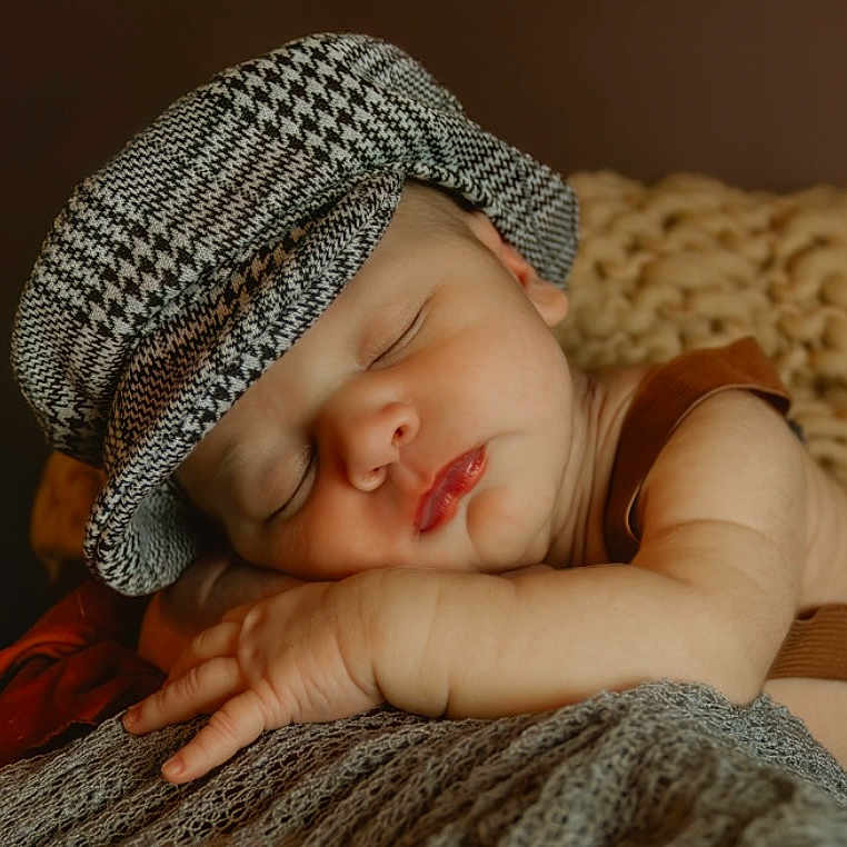Braxtyn is registered to the contest to win money with this photo: baby, beanie, blanket, bodypart, bonnet, cap, clothing, face, finger, hand, happy, hat, head, newborn, person, photography, portrait, sleeping, smile