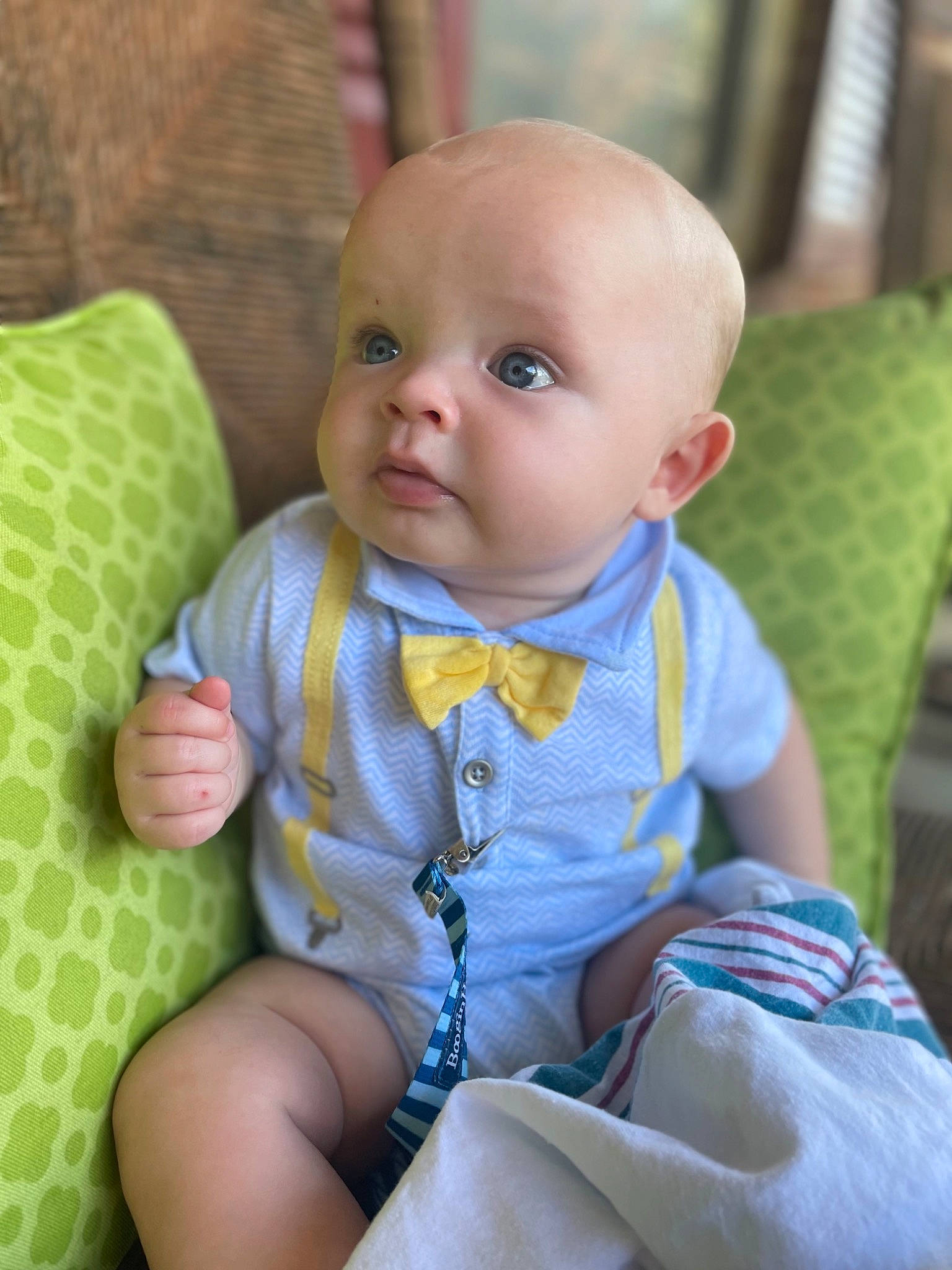 Kacen is registered to the contest to win money with this photo: baby, baby_products, baby_toddler_clothing, chair, cheek, child, comfort, dress, eye, fun, grass, iris, lap, linens, pattern, person, product, sitting, skin, sleeve