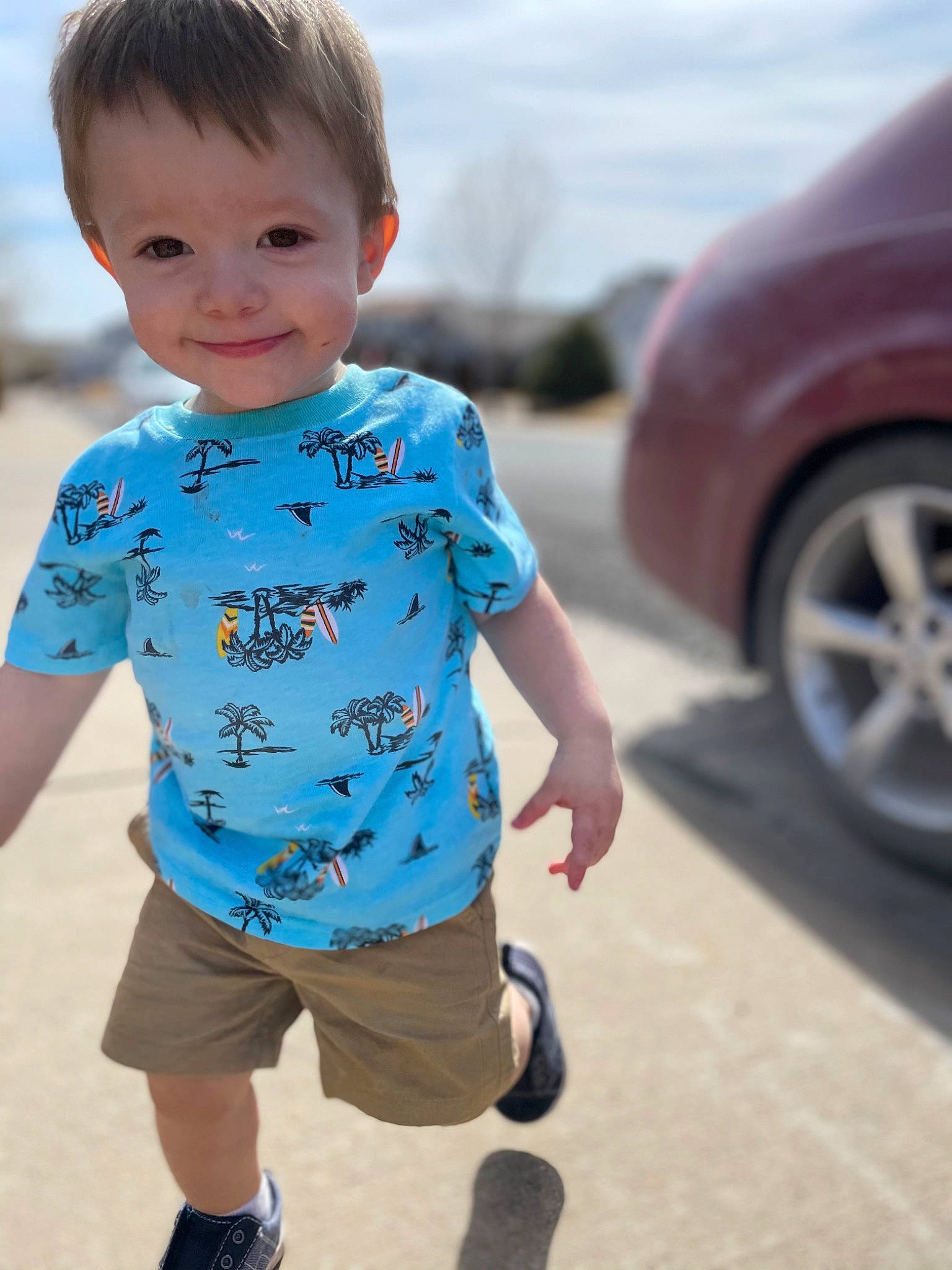 Sebastian joined the competition — help win amazing prizes! automotive_design, automotive_exterior, automotive_lighting, automotive_tire, azure, baby, baby_toddler_clothing, car, face, grass, happy, head, joy, person, shoulder, sky, sleeve, standing, tire, toddler