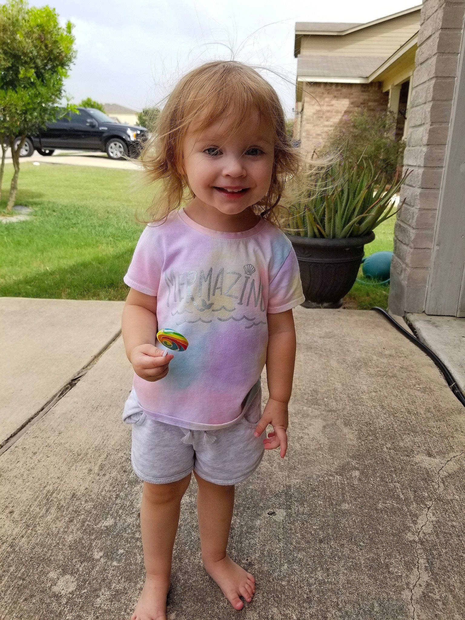 Fallon joined the competition — help win amazing prizes! child, dress, fun, grass, head, joy, leg, person, pink, plant, play, shoulder, skin, sleeve, smile, summer, t_shirt, toddler, vacation, walking