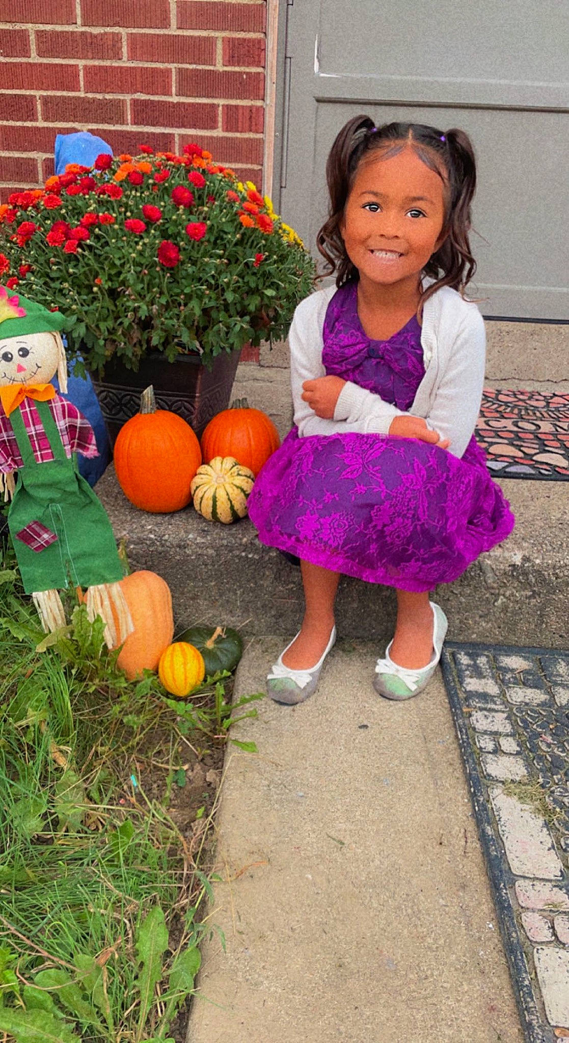 Adelina is registered to the contest to win money with this photo: baby_toddler_clothing, calabaza, cucurbita, dress, flower, gourd, grass, joy, leaf, leisure, local_food, natural_foods, orange, person, plant, pumpkin, smile, squash, toddler, tree