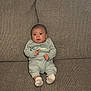 baby, infant, child, calvin_klein, clothing, socks, couch, sofa, seated, indoor, face, portrait, cute, young, person, expression, looking, home, furniture, texture