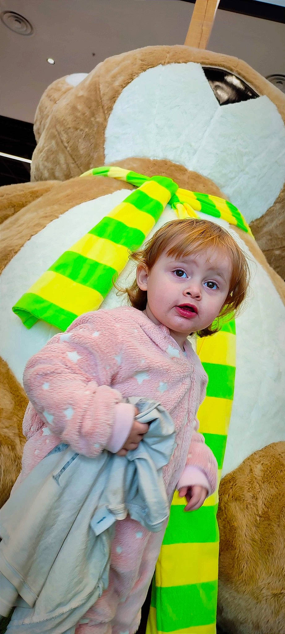 Zoé participe au concours pour gagner de l'argent avec cette photo : baby, baby_toddler_clothing, cheek, child, dress, event, eye, facial_expression, fun, grass, hairstyle, happy, head, iris, person, pink, product, skin, sleeve, surprise