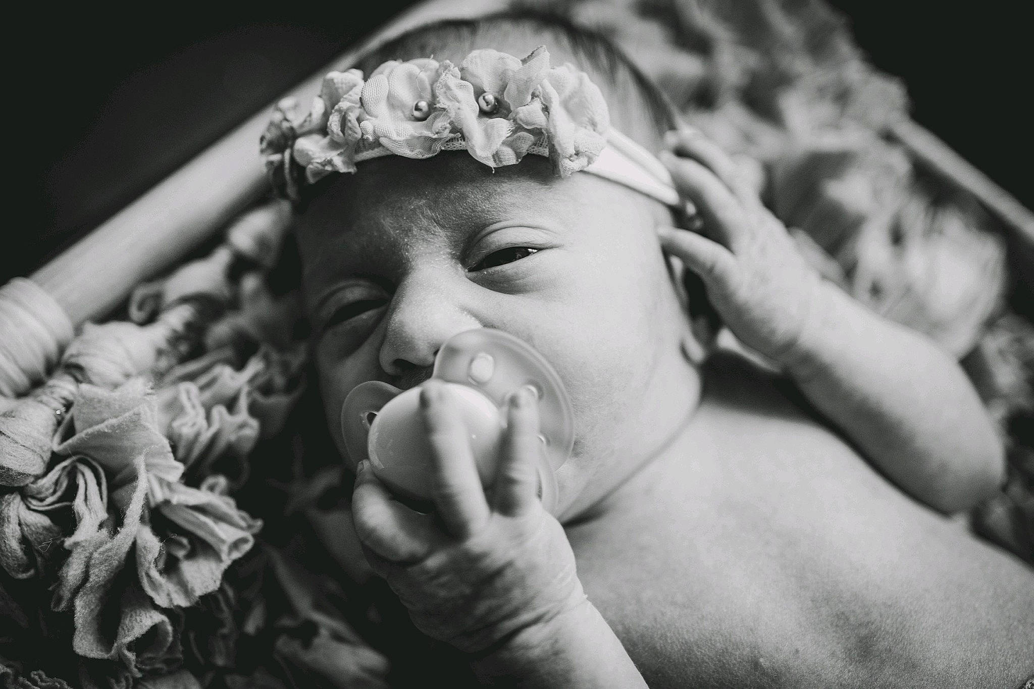 Aubreigh is registered to the contest to win money with this photo: baby, black_and_white, child, eye, finger, gesture, hair_accessory, hand, happy, headgear, headpiece, monochrome, monochrome_photography, person, photograph, photography, portrait, portrait_photography, smile, stock_photography
