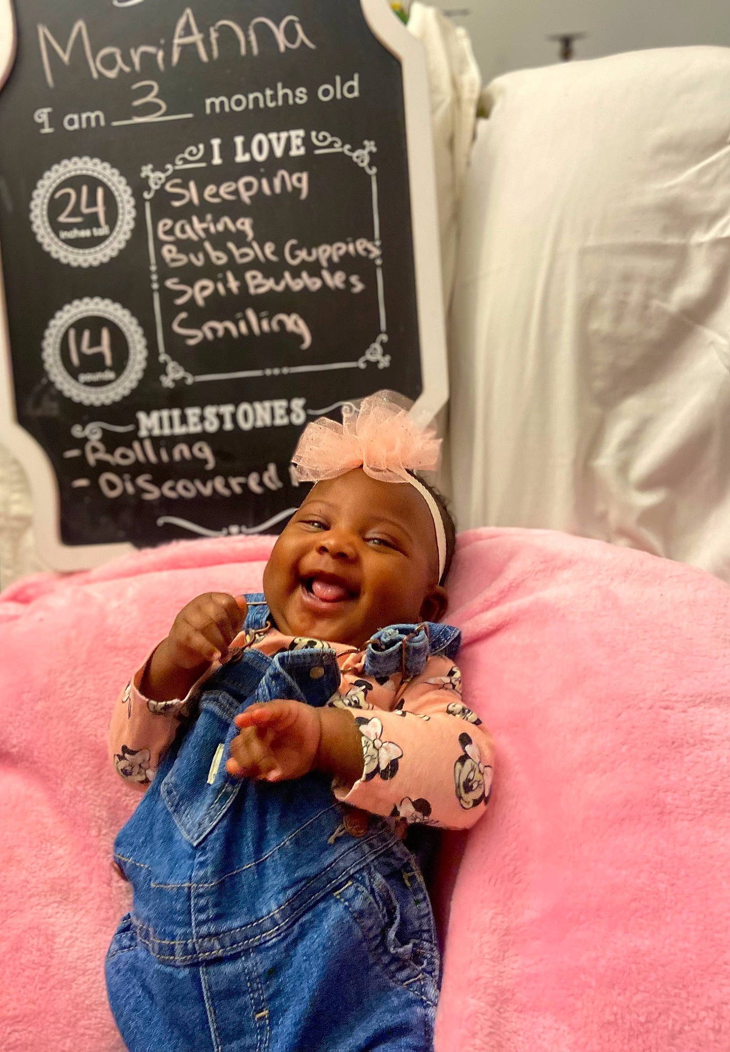 Marianna is registered to the contest to win money with this photo: baby, blackboard, bracelet, chalk, denim, event, fashion_accessory, font, gesture, hand, handwriting, happy, headwear, jewellery, linens, necklace, people, person, room, smile