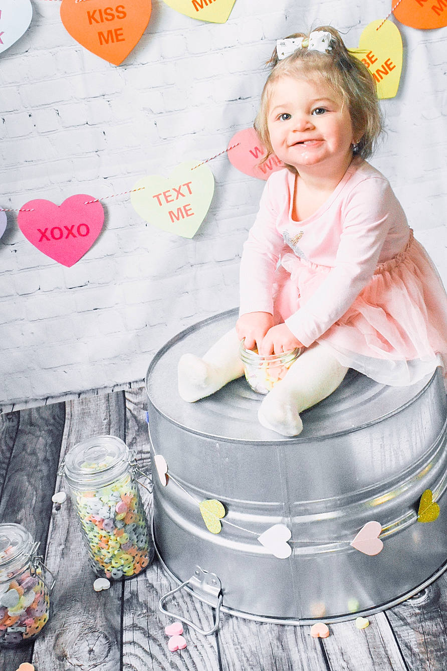 Khali is registered to the contest to win money with this photo: baby_toddler_clothing, child, child_model, heart, joy, love, peach, person, pink