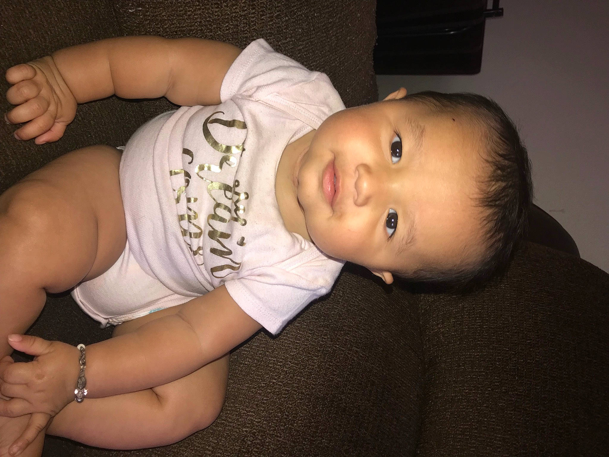 Echo is registered to the contest to win money with this photo: baby, baby_toddler_clothing, cheek, comfort, elbow, eyelash, finger, flash_photography, glasses, hand, human_body, joint, leg, mouth, muscle, neck, nose, person, skin, stomach