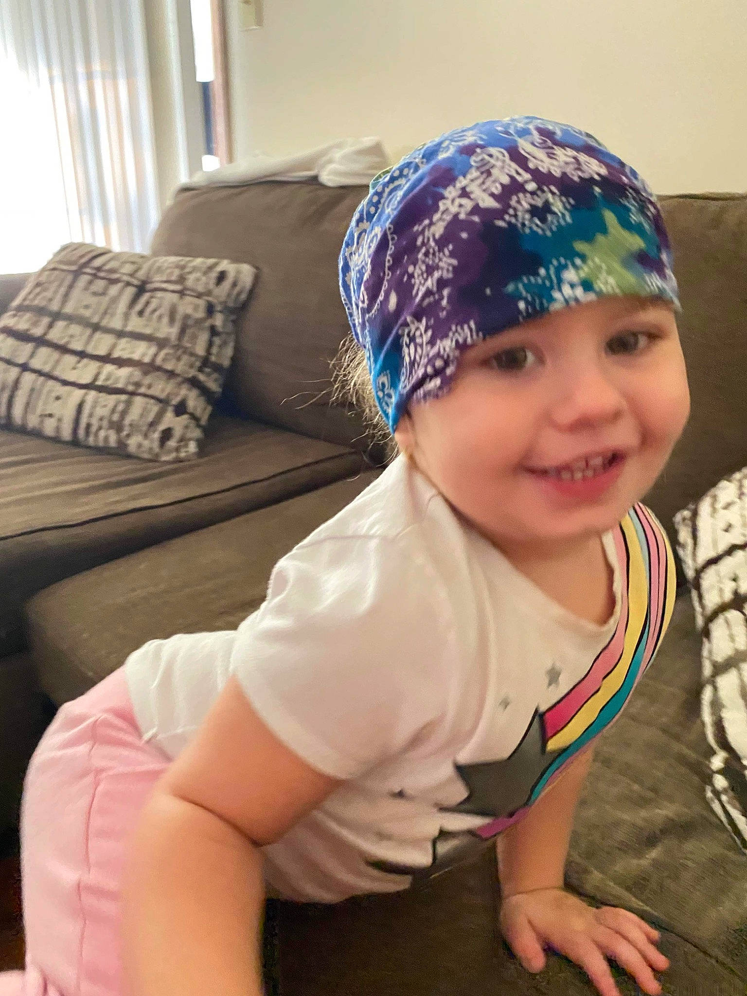 Amy joined the competition — help win amazing prizes! cap, comfort, cool, couch, elbow, eye, flooring, happy, head, headwear, human_body, human_leg, joy, knee, knit_cap, neck, pattern, person, sleeve, smile