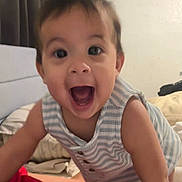Luka joined the competition — help win amazing prizes! baby, child, smiling, indoor, bed, curtains, striped_clothing, happy, face, person, crawling, mouth_open, eyes, arm, furniture, blanket, home, infant, portrait, closeup